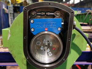 Modified looper rolls with magnetic encoder (pulse wheel and scanning head) and new housing for the basket roller bearing
